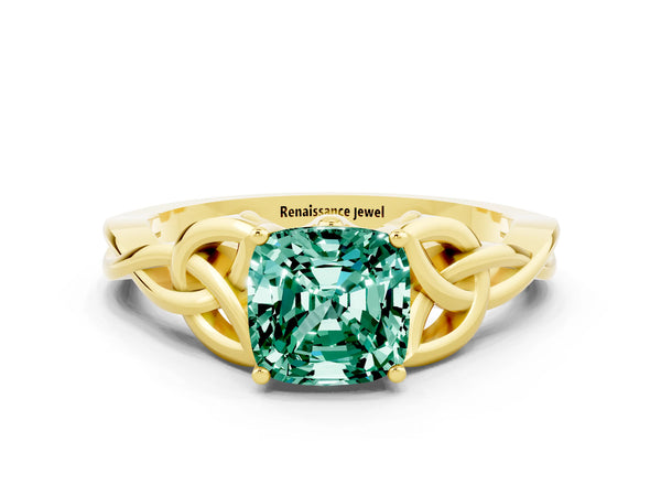 Yellow gold Cushion Cut Green Sapphire Solitaire Engagement Ring with Celtic Knot Band and Four-Prong Setting