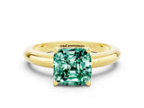 Yellow gold Cushion Cut Green Sapphire Solitaire Engagement Ring with Round Band and Four-Prong Setting