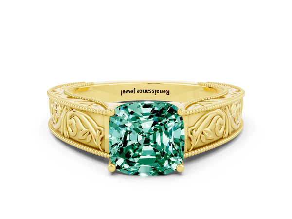 Yellow gold Cushion Cut Green Sapphire Solitaire Ring with Engraved Band and Four-Prong Setting