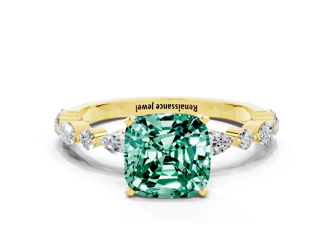 Yellow gold Cushion Cut Green Sapphire Solitaire with Side Stones on a Pavé Band and Four-Prong Setting