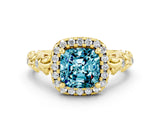 Yellow gold Cushion Cut Halo Diamond Solitaire with Filigree Band and Four-Prong Setting