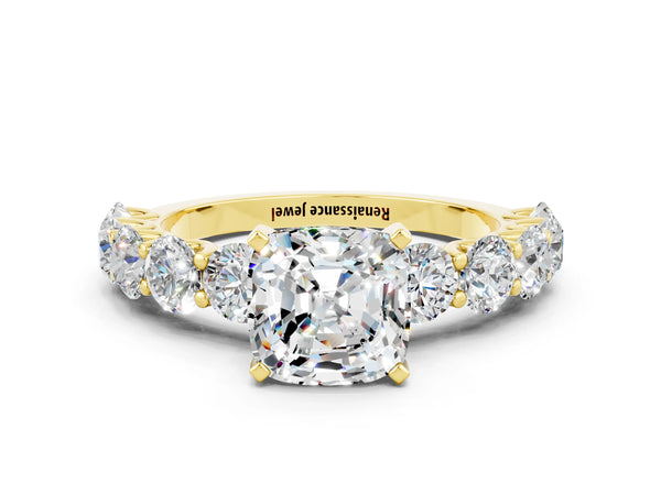 Yellow gold Cushion Cut Moissanite Prong Setting with Side Stones on a Pave Band