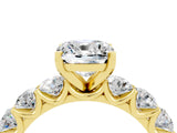 Yellow gold Cushion Cut Moissanite Prong Setting with Side Stones on a Pave Band_4