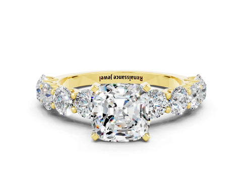 Yellow gold Cushion Cut Moissanite Prong Setting with Side Stones on a Pave Band