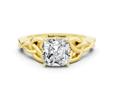 Yellow gold Cushion Cut Moissanite Solitaire Engagement Ring with Celtic Knot Band and Four-Prong Setting