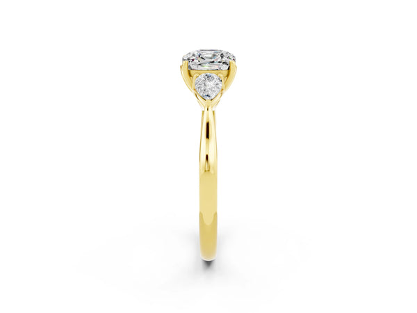 Yellow gold Cushion Cut Moissanite Three-Stone Ring with Pear  Side Stones and Prong Setting