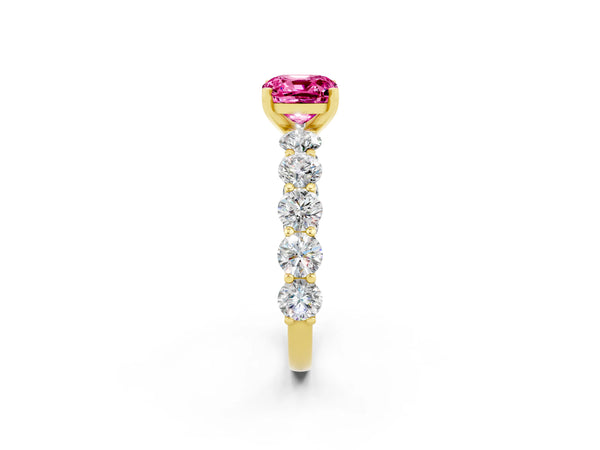 Yellow gold Cushion Cut Pink Sapphire Prong Setting with Side Stones on a Pave Band