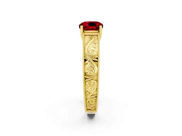 Yellow gold Cushion Cut Ruby Solitaire Ring with Engraved Band and Four-Prong Setting