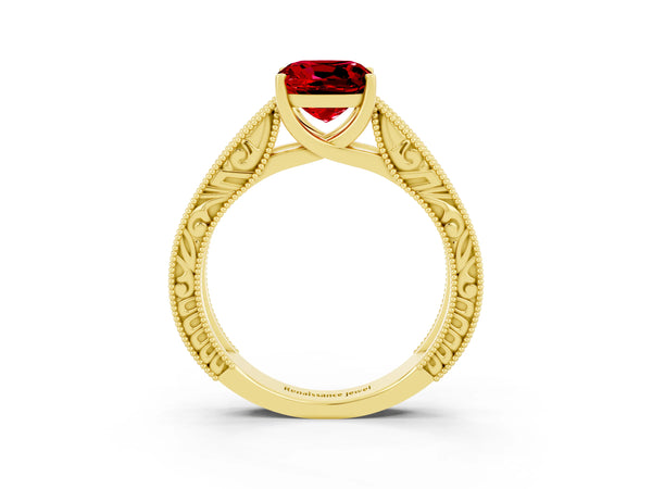 Yellow gold Cushion Cut Ruby Solitaire Ring with Engraved Band and Four-Prong Setting