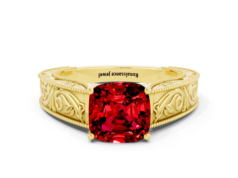 Yellow gold Cushion Cut Ruby Solitaire Ring with Engraved Band and Four-Prong Setting