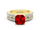 Yellow gold Cushion Cut Ruby Solitaire Ring with Pavé and Channel Set Band