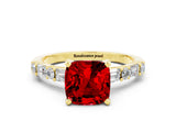 Yellow gold Cushion Cut Ruby Solitaire with Side Baguettes and Channel Set Band