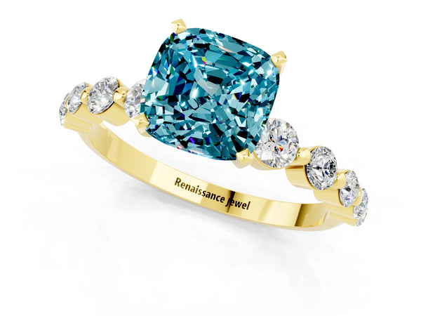 Yellow gold Cushion Cut Solitaire Blue Topaz Ring with Pave Band and Four-Prong Setting