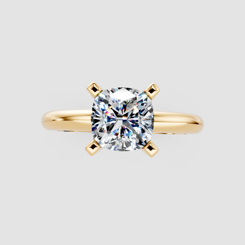 Yellow gold Cushion Cut Solitaire Engagement Ring with Round Band and Four-Prong Setting