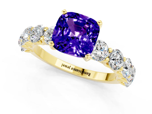 Yellow gold Cushion Cut Tanzanite Prong Setting with Side Stones on a Pave Band