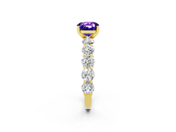 Yellow gold Cushion Cut Tanzanite Prong Setting with Side Stones on a Pave Band
