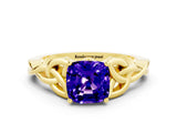 Yellow gold Cushion Cut Tanzanite Solitaire Engagement Ring with Celtic Knot Band and Four-Prong Setting
