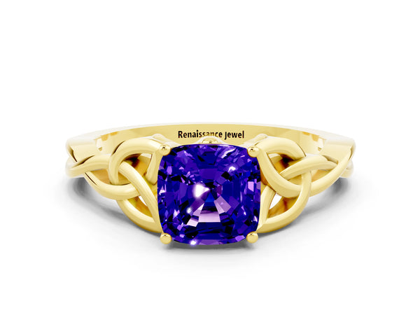 Yellow gold Cushion Cut Tanzanite Solitaire Engagement Ring with Celtic Knot Band and Four-Prong Setting