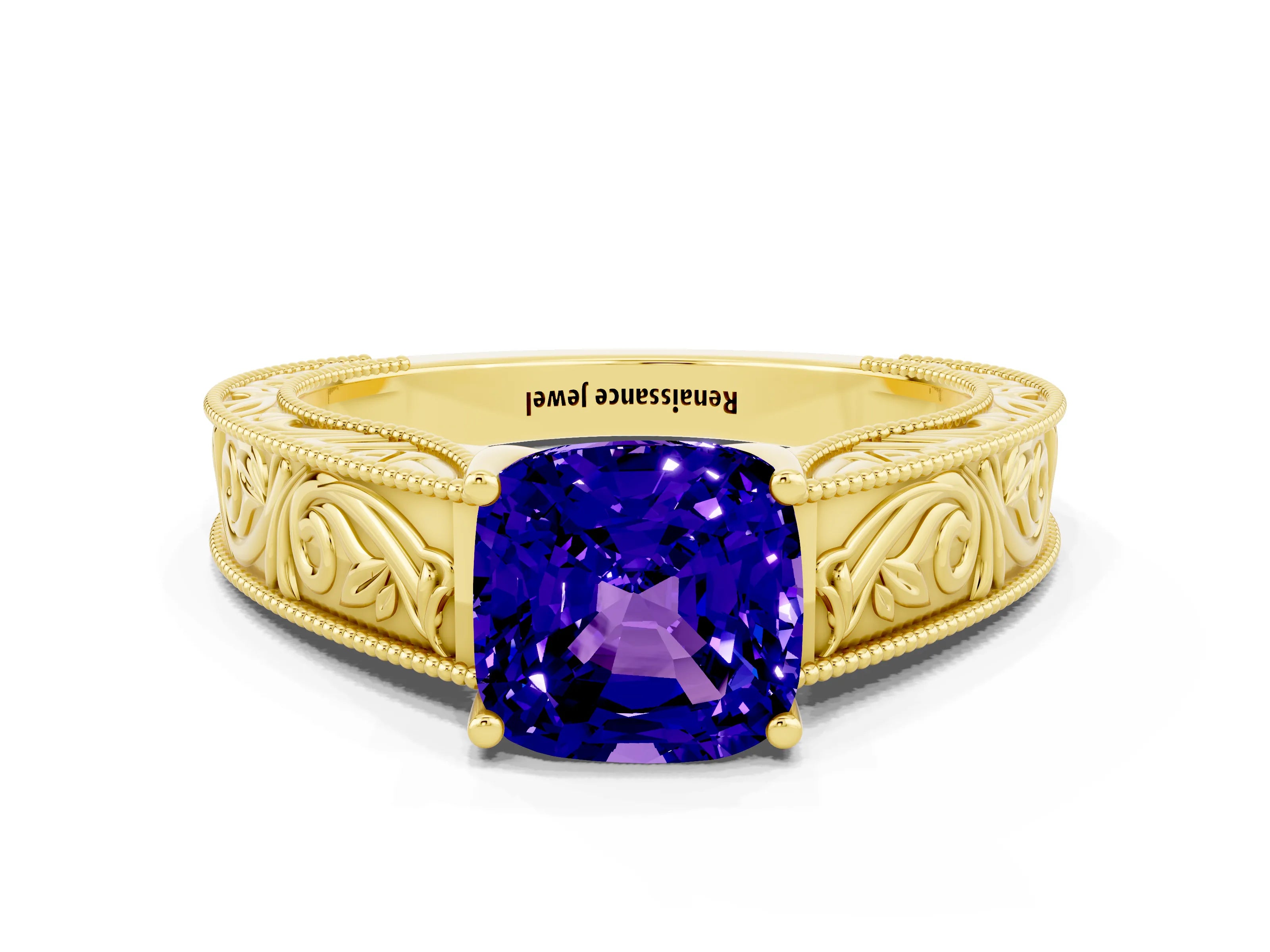 Yellow gold Cushion Cut Tanzanite Solitaire Ring with Engraved Band and Four-Prong Setting