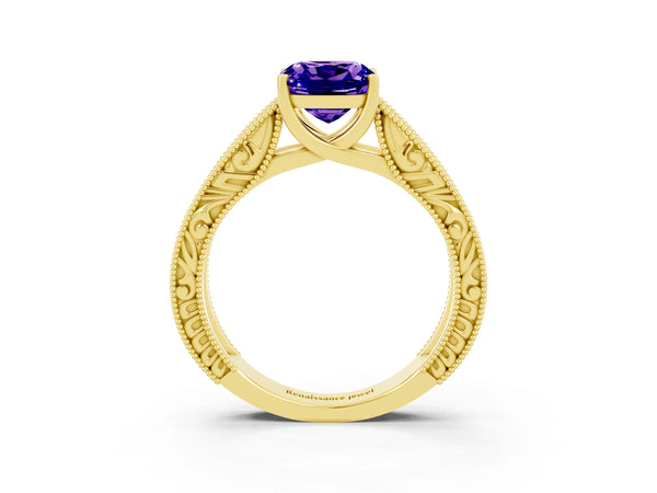 Yellow gold Cushion Cut Tanzanite Solitaire Ring with Engraved Band and Four-Prong Setting