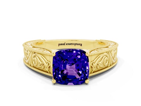 Yellow gold Cushion Cut Tanzanite Solitaire Ring with Engraved Band and Four-Prong Setting