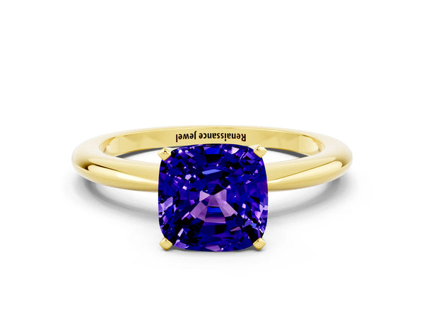 Yellow gold Cushion Cut Tanzanite Solitaire Ring with Six-Prong Setting and Classic Band