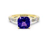Yellow gold Cushion Cut Tanzanite Solitaire with Side Baguettes and Channel Set Band
