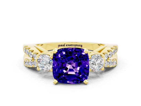 Yellow gold Cushion Cut Tanzanite Three-Stone Ring with Pavé Split Shank and Four-Prong Setting