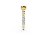 Yellow gold Cushion Cut Yellow Sapphire Prong Setting with Side Stones on a Pave Band_26