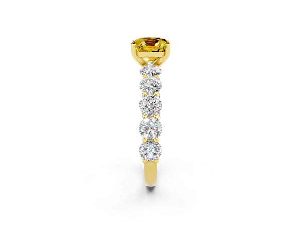 Yellow gold Cushion Cut Yellow Sapphire Prong Setting with Side Stones on a Pave Band