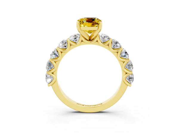 Yellow gold Cushion Cut Yellow Sapphire Prong Setting with Side Stones on a Pave Band
