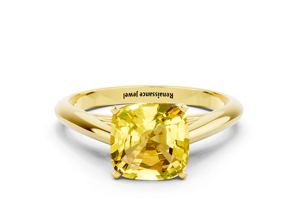 Yellow gold Cushion Cut Yellow Sapphire Solitaire Engagement Ring with Cathedral Setting and Four-Prong Mount