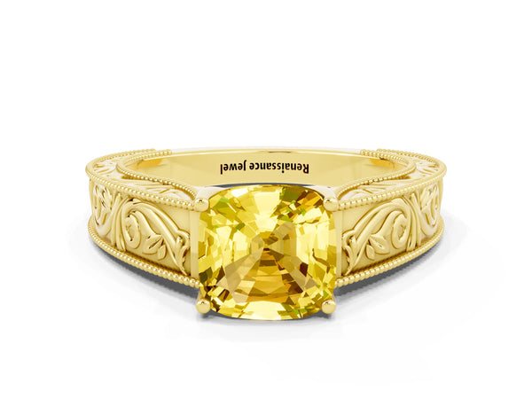 Yellow gold Cushion Cut Yellow Sapphire Solitaire Ring with Engraved Band and Four-Prong Setting