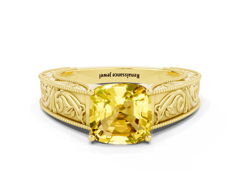 Yellow gold Cushion Cut Yellow Sapphire Solitaire Ring with Engraved Band and Four-Prong Setting