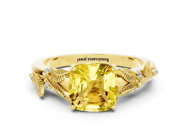 Yellow gold Cushion Cut Yellow Sapphire Solitaire Ring with Leaf Motif Band and Four-Prong Setting