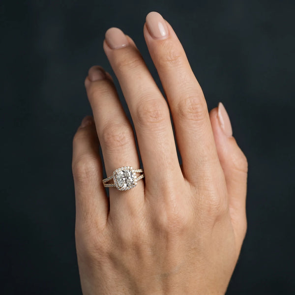 Yellow gold Cushion Diamond Halo Ring with Split Shank Pavé Band and Four-Prong Setting