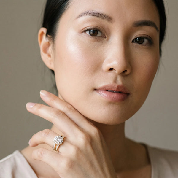 Yellow gold Cushion Diamond Halo Ring with Split Shank Pavé Band and Four-Prong Setting