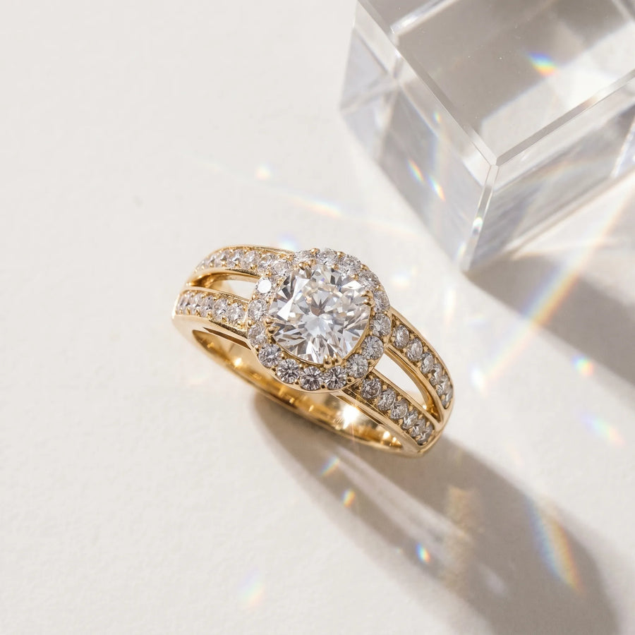 Yellow gold Cushion Diamond Halo Ring with Split Shank Pavé Band and Four-Prong Setting