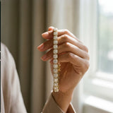 10K Yellow Gold 6.29 Carat F-G VS-SI Cushion Halo Diamond Tennis Bracelet with Channel Band and Bezel Setting