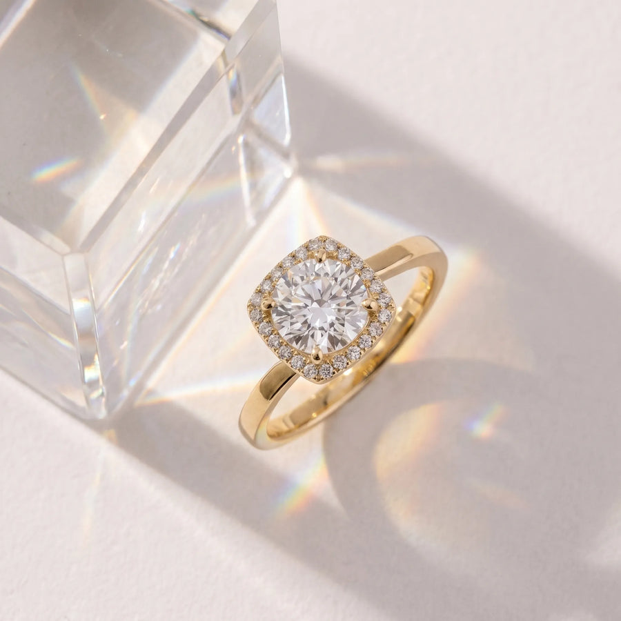 Yellow gold Cushion Halo Solitaire Engagement Ring with Round Diamond and Four-Prong Setting