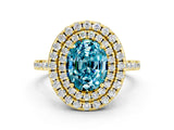 Yellow gold Double Halo Oval Cut Blue Topaz Pavé Band with Four-Prong Setting