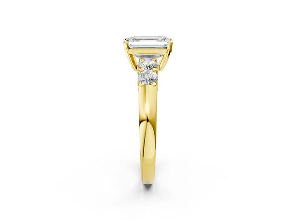 Yellow gold Emerald Brilliant Diamond Five-Stone Engagement Ring with Prong Setting on a Classic Band