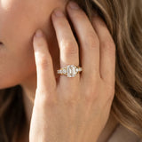 Yellow gold Emerald Brilliant Solitaire with Side Stones on a Pave Band and Four-Prong Setting_64