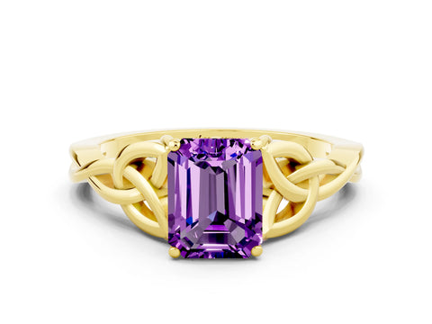 Yellow gold Emerald Cut Amethyst Solitaire Engagement Ring with Celtic Knot Band and Four-Prong Setting