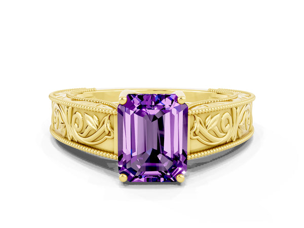 Yellow gold Emerald Cut Amethyst Solitaire Ring with Engraved Band and Four-Prong Setting