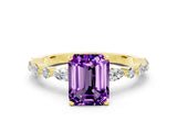 Yellow gold Emerald Cut Amethyst Solitaire with Side Stones on a Pavé Band and Four-Prong Setting