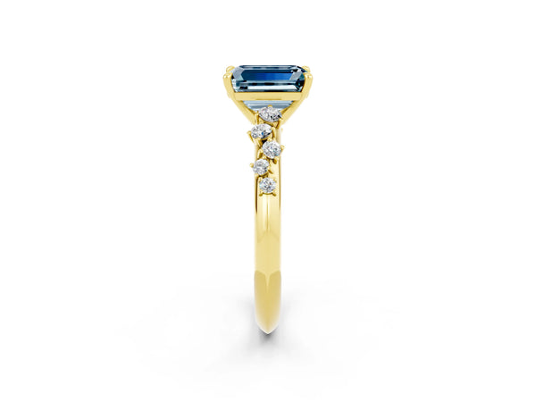 Yellow gold Emerald Cut Aquamarine Cluster Side Stone Solitaire Ring with Prong Setting