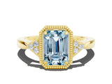 Yellow gold Emerald Cut Aquamarine Halo Ring with Tapered Band and Four-Prong Setting