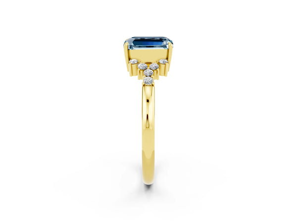 Yellow gold Emerald Cut Aquamarine Ring with Side Stones and Four-Prong Setting