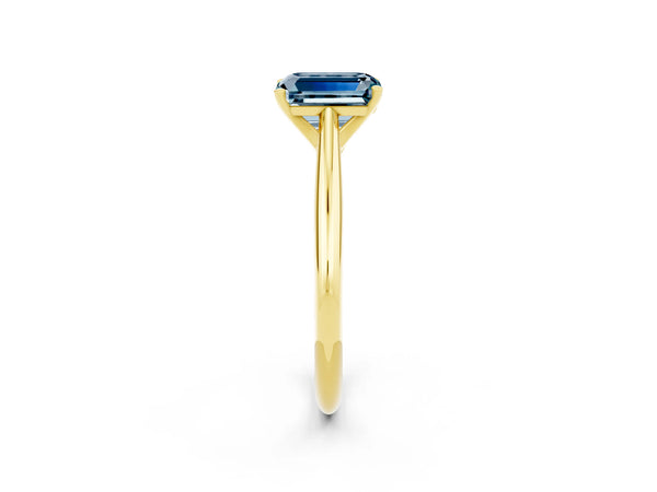 Yellow gold Emerald Cut Aquamarine Solitaire Engagement Ring with Cathedral Setting and Four-Prong Mount